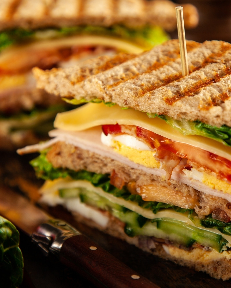 http://Chicken%20club%20sandwhich%20on%20toasted%20bread%20served%20at%20the%20snooty%20fox
